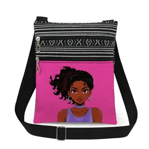 Canvas crossbody messenger bag featuring black white stripes and unique graphic print.