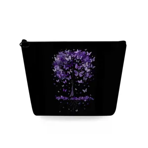 Detail view of black cosmetic bag featuring a stunning purple butterfly tree print design.