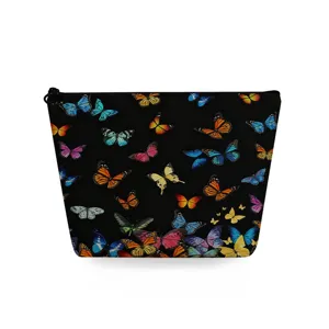 Close-up of the cosmetic pouch with vibrant colorful butterfly print and black zipper.