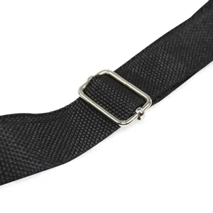 Adjustable black strap detail for crossbody shoulder bag, durable metal buckle and fabric.