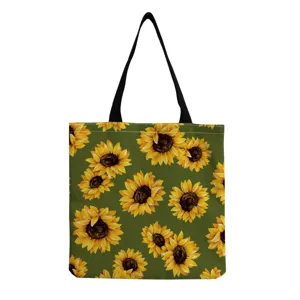 Detailaufnahme des grünen Sonnenblumen Druck Leinwand Tragetaschen Stoffes mit Schultergurt.
