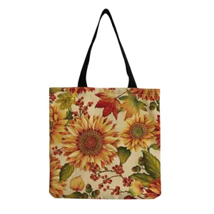 Detailansicht der Sonnenblumen Tragetasche mit herbstlichem Blumenmuster und Stoffstruktur.