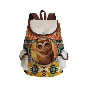 Detailed view of cute owl print canvas backpack with ethnic geometric pattern and brown straps.