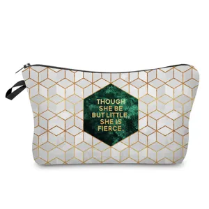 Detailed view of stylish geometric pattern cosmetic bag featuring inspiring motivational quote.