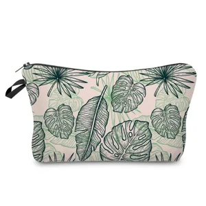 Tropical green leaf print cosmetic bag, stylish women's waterproof toiletry pouch and clutch.