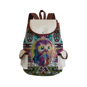Colorful owl print backpack with ethnic geometric pattern, stylish school bag for students.