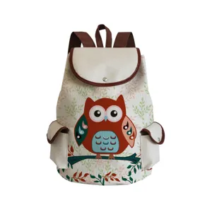 Cute owl print canvas backpack details, casual daypack with brown trim and side pockets.