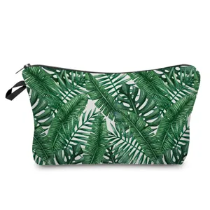 Tropical leaf print cosmetic bag, stylish women makeup pouch for travel and daily use.