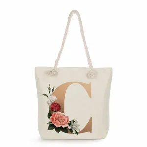 Canvas tote bag for women large capacity shoulder bag with gold letter C and floral print.