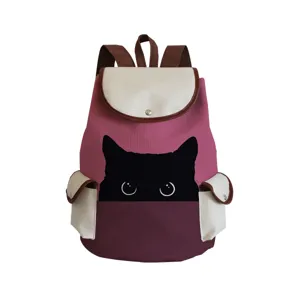 Cute cat print canvas backpack detail, pink colorblock school bag with side pockets and straps.