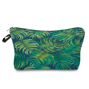 Tropical monstera leaf print cosmetic bag, stylish waterproof travel makeup pouch for women.