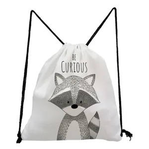 Close-up detail of the cute raccoon print and BE CURIOUS text on the white drawstring bag.