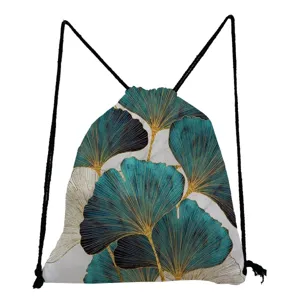 Detailed view of the stylish teal and gold ginkgo leaf print drawstring backpack.