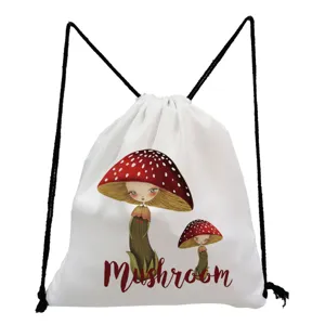 Close-up detail of the white drawstring bag featuring a cute red mushroom print design.
