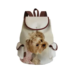 Canvas backpack detail featuring a cute dog print, brown straps, and front flap design.