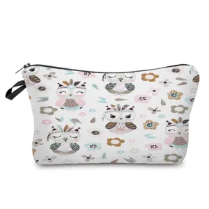 Cute owl print cosmetic bag detail, showing clean fabric pattern and smooth zipper closure.