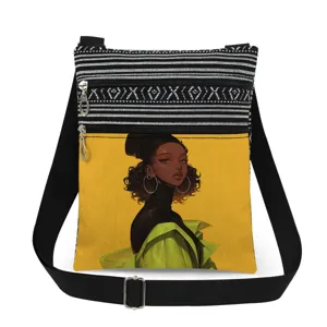 Vue détaillée du sac bandoulière montrant l'impression artistique et la double fermeture.