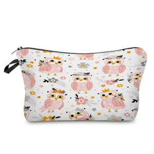 Cute pink owl print cosmetic bag detail, portable zipper makeup pouch for travel and daily use.