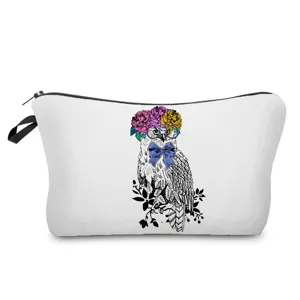 Detailed view of cosmetic bag with cute owl print, zipper closure and handy side strap.