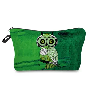 Green owl print cosmetic bag multi-functional travel makeup pouch with zipper and handle.