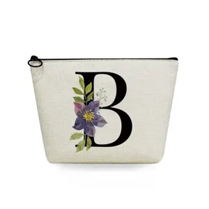 Detail view of canvas makeup bag with letter B print, perfect for daily cosmetic storage.