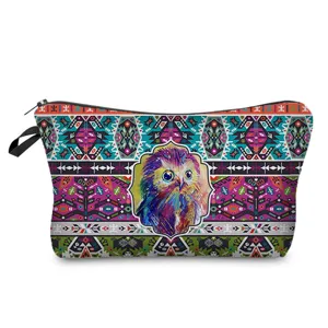 Detailed view of the colorful owl patterned cosmetic bag, featuring vibrant tribal prints.