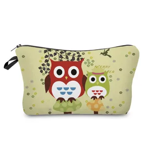 Detailed close-up view of the cute cartoon owl printed cosmetic bag zipper closure fabric.