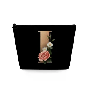 Zwarte canvas cosmetische make-uptas met vintage bloemen letter I print voor dames reizen.