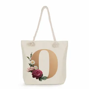 Canvas tote bag with floral letter O print, large capacity casual single shoulder handbag.