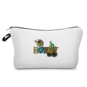 Nahaufnahme einer weißen Kosmetiktasche aus Leinen mit Western-Buchstaben-Print und Details.
