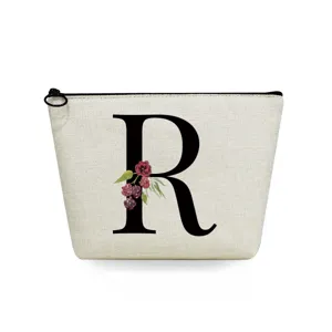 Detailed view of the stylish canvas cosmetic bag featuring a bold letter R and floral print.