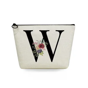 Canvas makeup bag with black letter W and vintage floral print for daily cosmetic storage.
