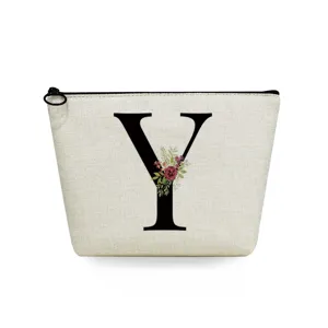Canvas cosmetic storage bag with black letter Y print detail, compact and stylish zipper bag.