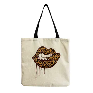Stylish canvas tote bag featuring a trendy leopard lips graphic design for daily casual use.