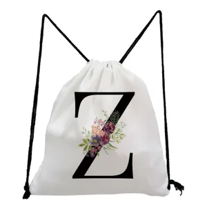 White canvas drawstring backpack featuring a floral letter Z print, casual student bag.