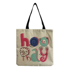Reusable canvas tote bag with cute cartoon letter print, stylish cotton linen shopping handbag.