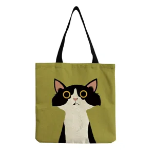 Detailed view of the cute cartoon cat print canvas tote bag, featuring clear stitching and fabric.