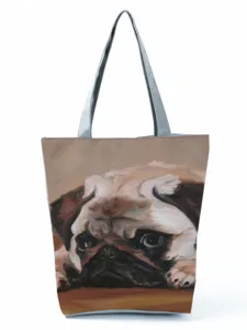 Cute pug print canvas shoulder tote bag, detailed view of the cute pet art pattern design.