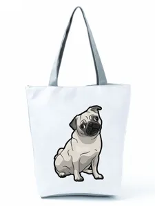 Detailed view of the cute pug print canvas tote bag, casual shoulder handbag with grey handles.