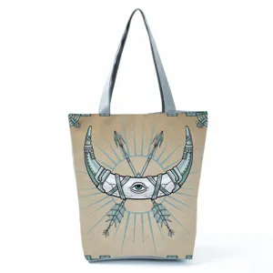 Canvas tote bag with mystical eye print, vintage design, large capacity casual shoulder bag.