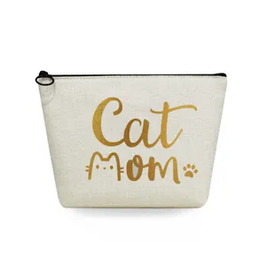 Portable canvas cosmetic makeup bag detail view showing clear Cat mom gold print design and zipper.