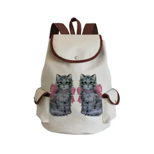 Detailed close-up view of the cute cat print canvas backpack showing clear dual kitten patterns.