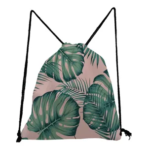 Tropical leaf print drawstring backpack with pink background and black cord. Detail view.