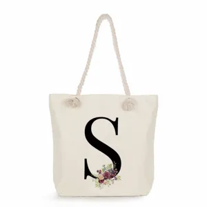 Segeltuch Tragetasche mit schwarzem Buchstaben S und Blumenmuster, Strandtasche gross.