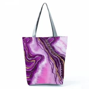 Detail view of the stylish purple marble pattern tote bag, featuring abstract artistic prints.