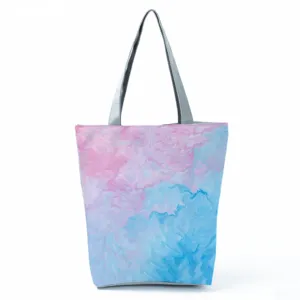Abstract pink and blue fluid art pattern detail on lightweight daily shoulder tote bag.