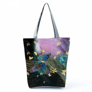 Detailed shot of the blue and purple abstract butterfly printed tote bag with golden linework.