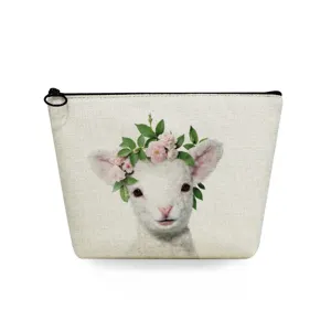 Detail shot of the portable travel cosmetic bag featuring cute lamb and floral print.