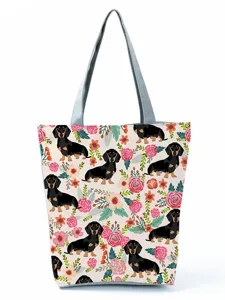 Joli sac cabas en toile avec imprimé teckel et fleurs, sac à main décontracté pour voyage.