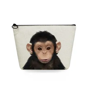Canvas cosmetic bag with cute baby chimpanzee print, portable travel makeup storage pouch.